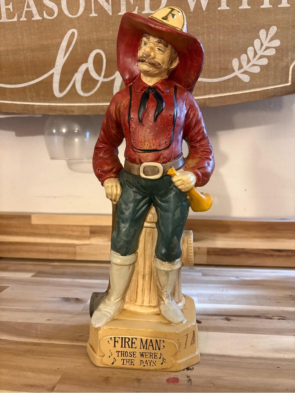 Vintage Fireman Figurine in Red, Green and Cream